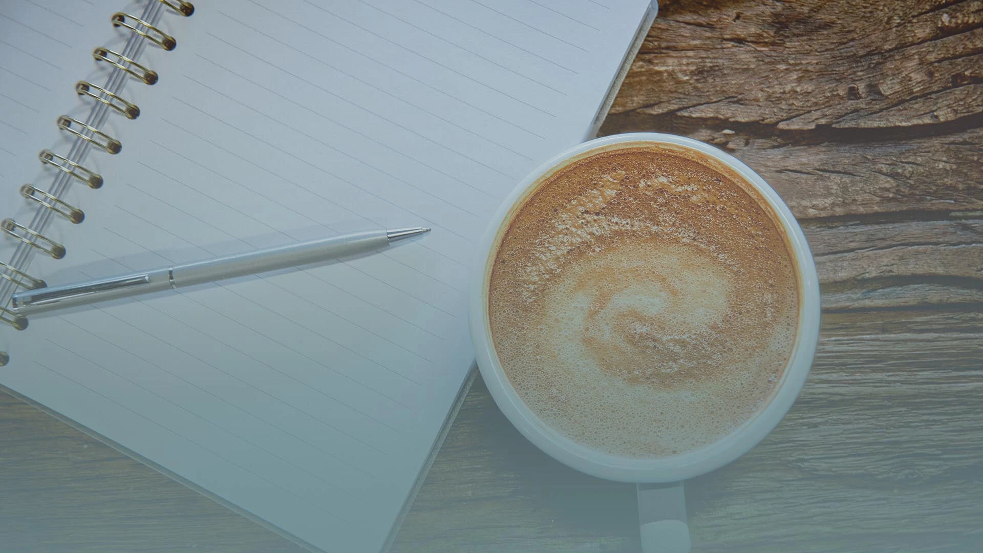 coffee and notebook on table